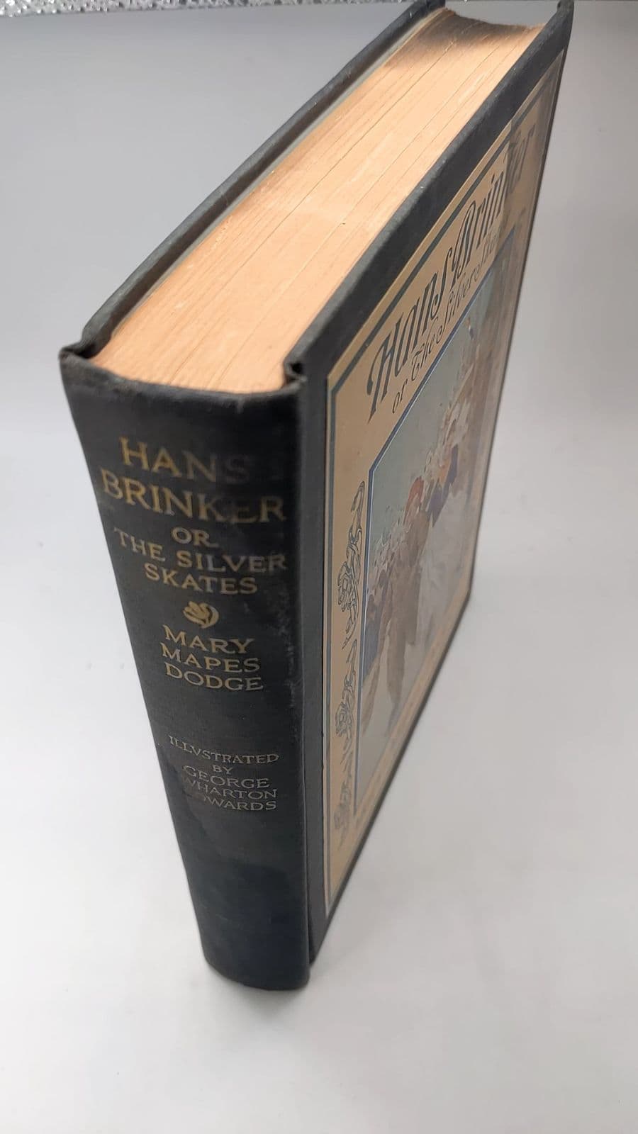 Hans Brinker or The Silver Skates by Mary Mapes Dodge - quarter view showing binding condition