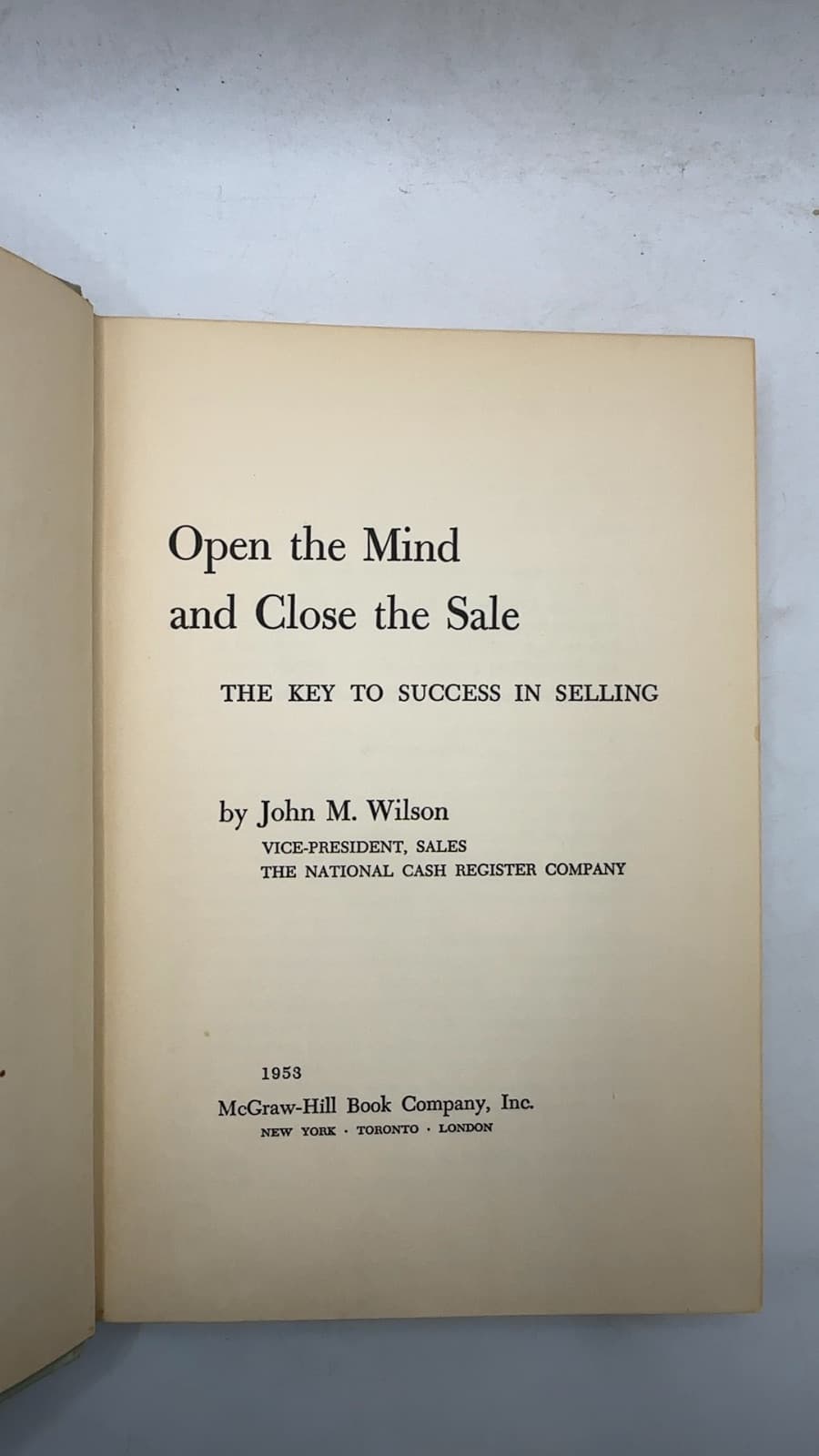 Open the Mind and Close the Sale by John M. Wilson - title page