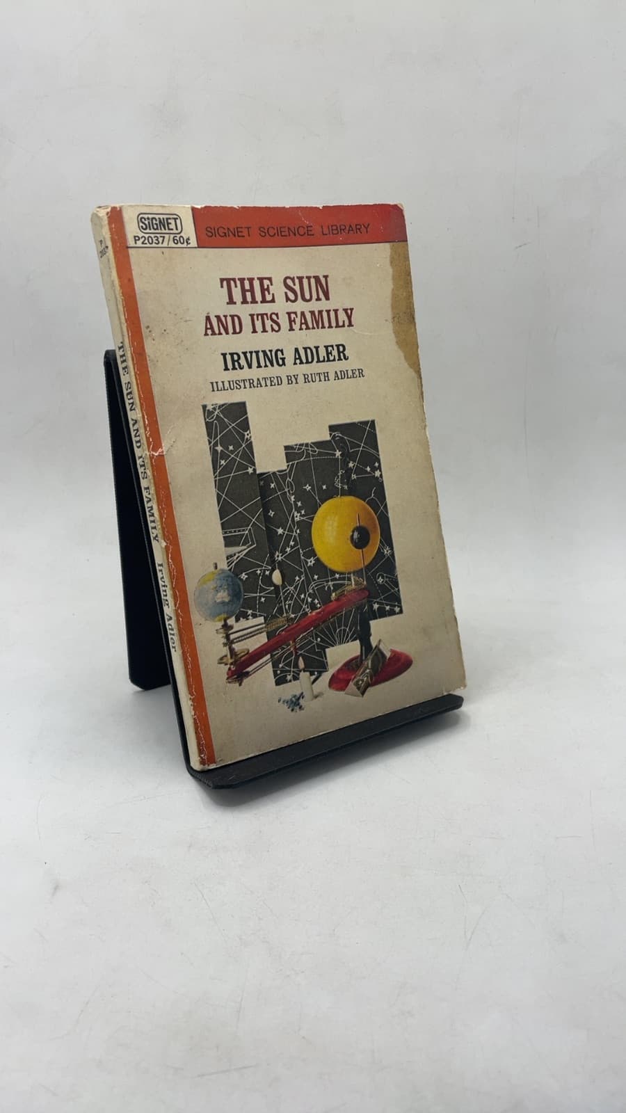 The Sun and Its Family by Irving Adler - front cover