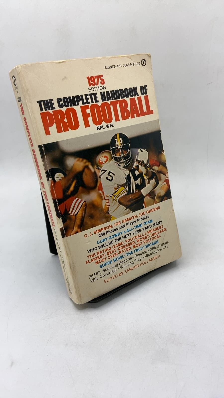 The Complete Handbook of Pro Football 1975 by Zander Hollander - front cover