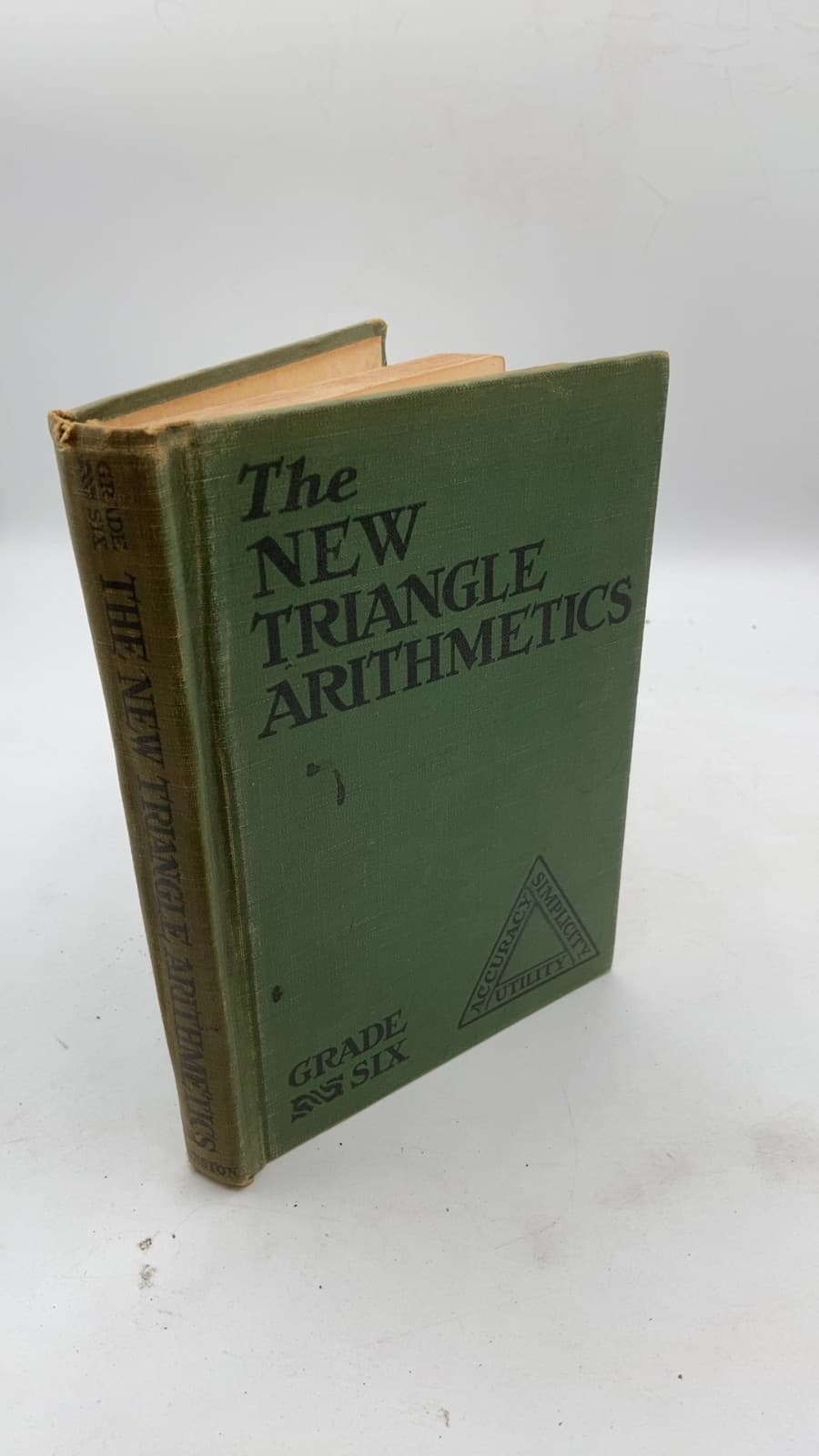 The New Triangle Arithmetics Grade Six by Leo J. Brueckner, C. J. Anderson, G. O. Banting, Elda L. Merton - front cover