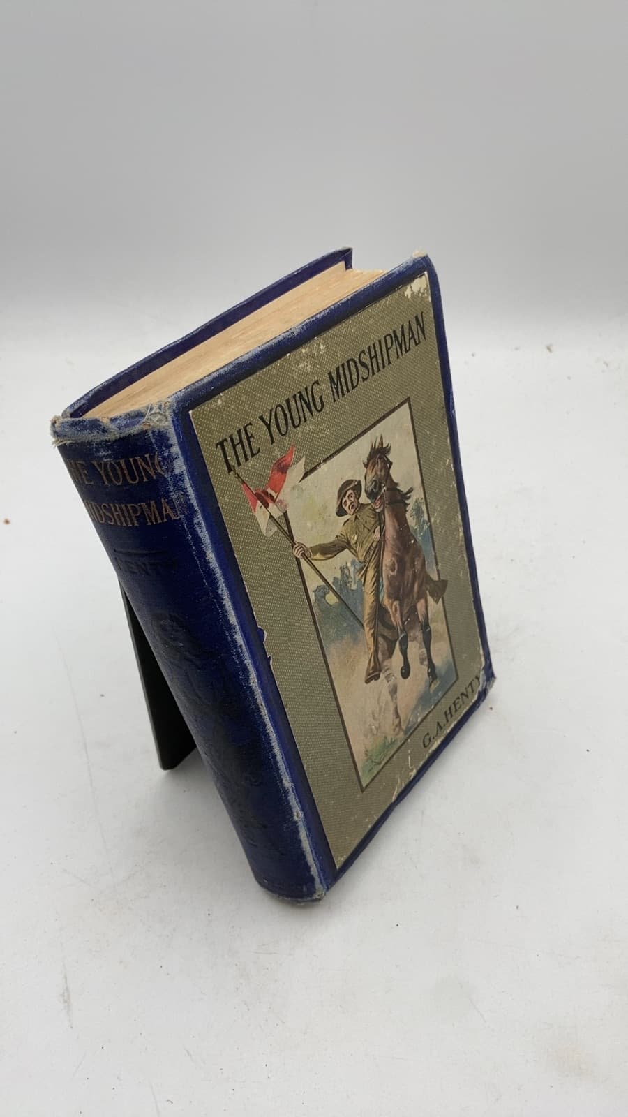 The Young Midshipman: A Story of the Bombardment of Alexandria by G. A. Henty - front cover