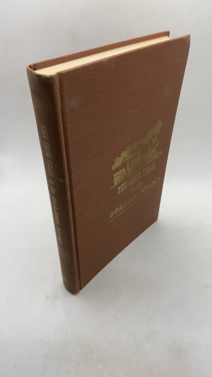The Iron Trail to the Golden Spike by John J Stewart - front cover
