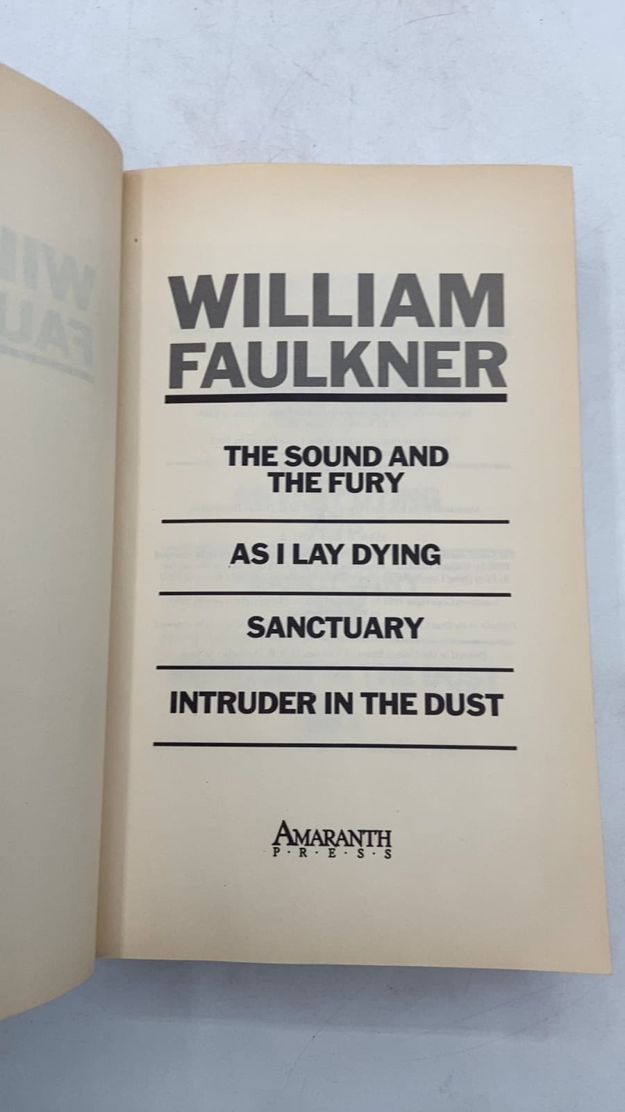The Sound and the Fury, As I Lay Dying, Sanctuary, Intruder in the Dust by William Faulkner - title page