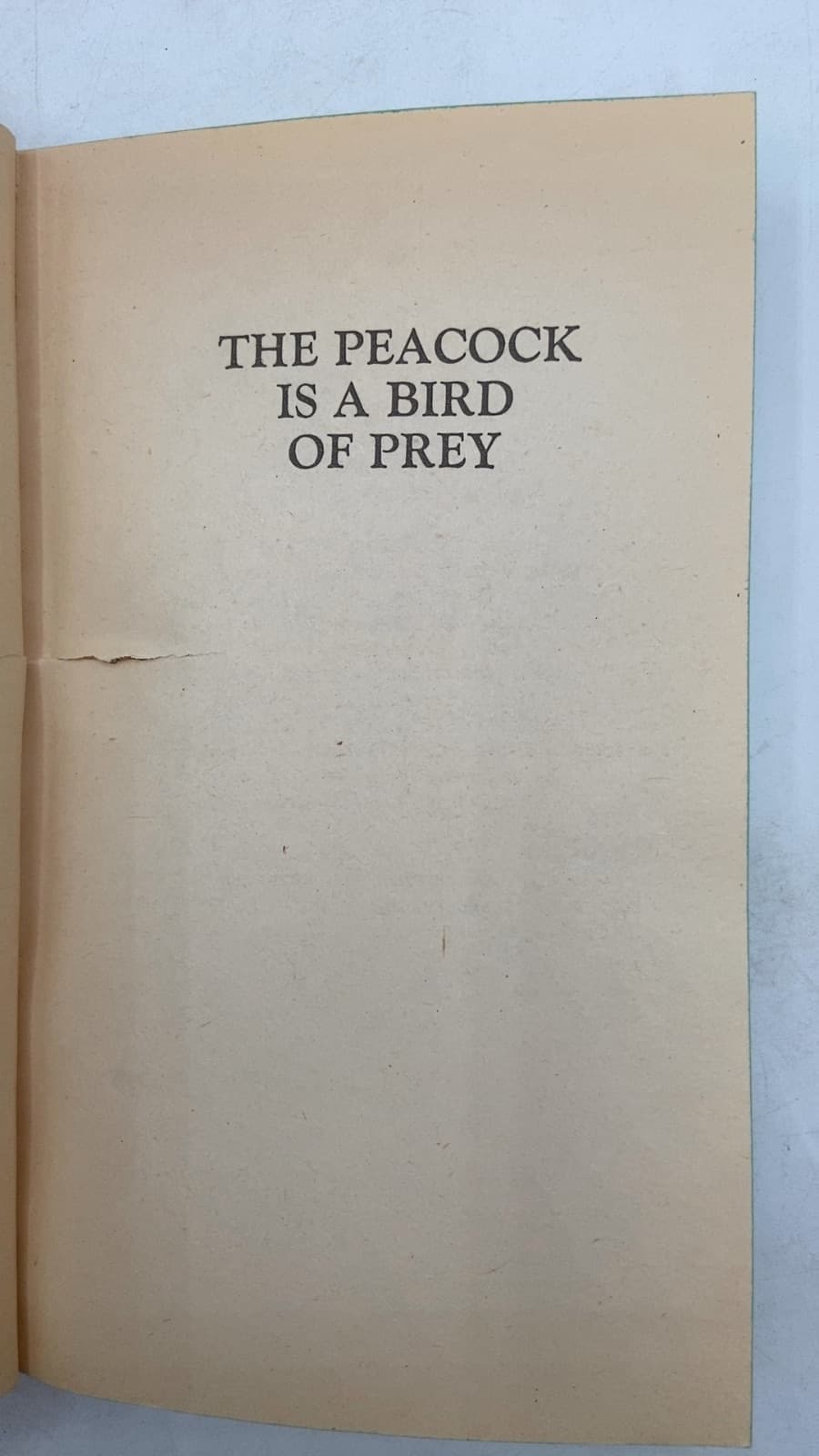 The Peacock Is a Bird of Prey by Rae Foley - title page