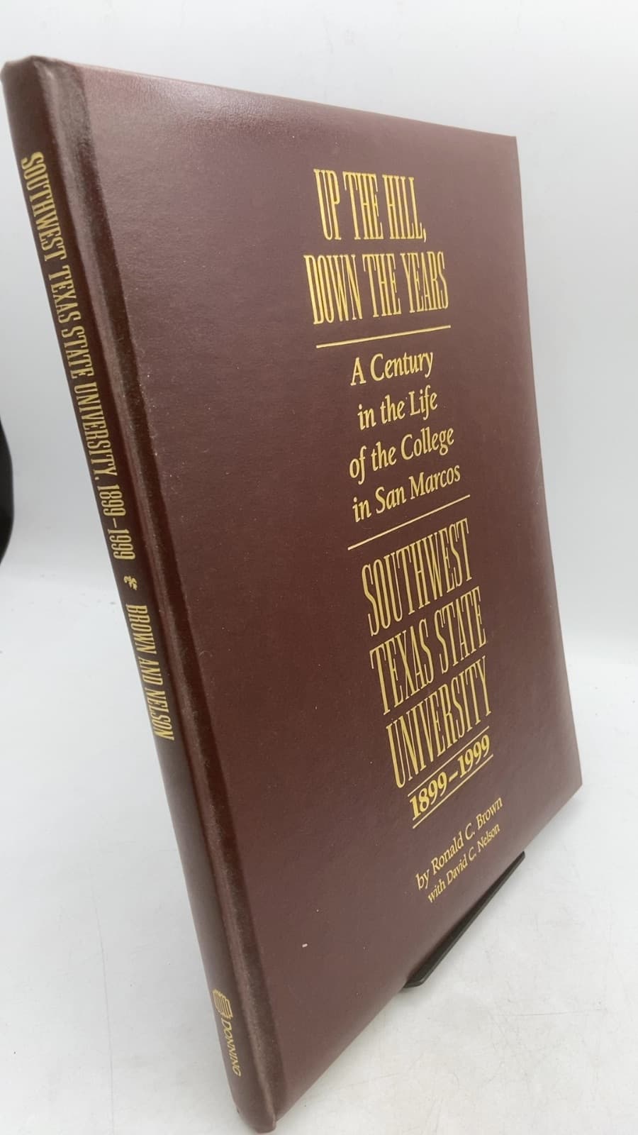 Up the Hill, Down the Years: A Century in the Life of the College in San Marcos, Southwest Texas State University, 1899–1999 by Ronald C. Brown with David C. Nelson - front cover
