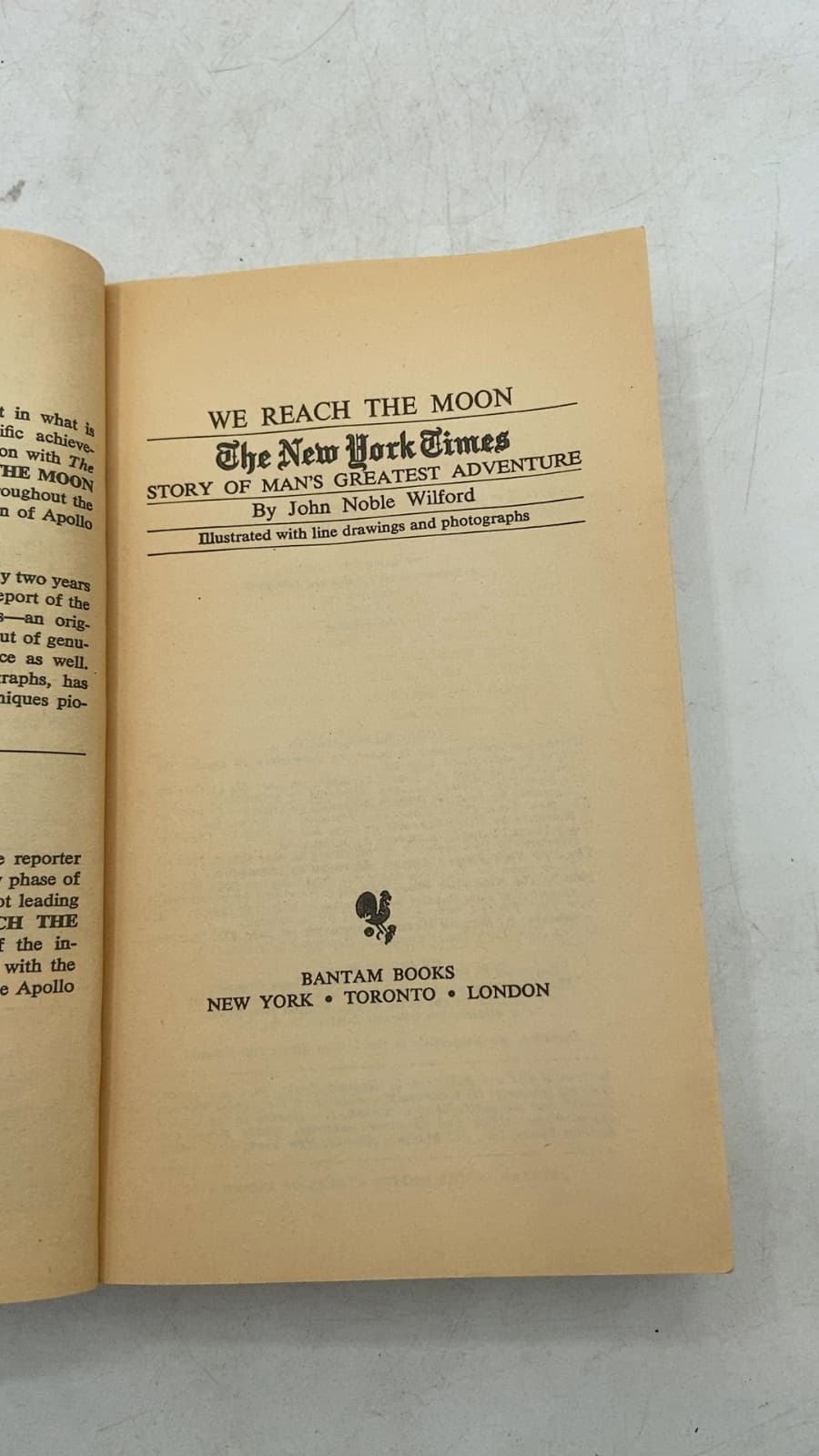 We Reach The Moon by John Noble Wilford - title page