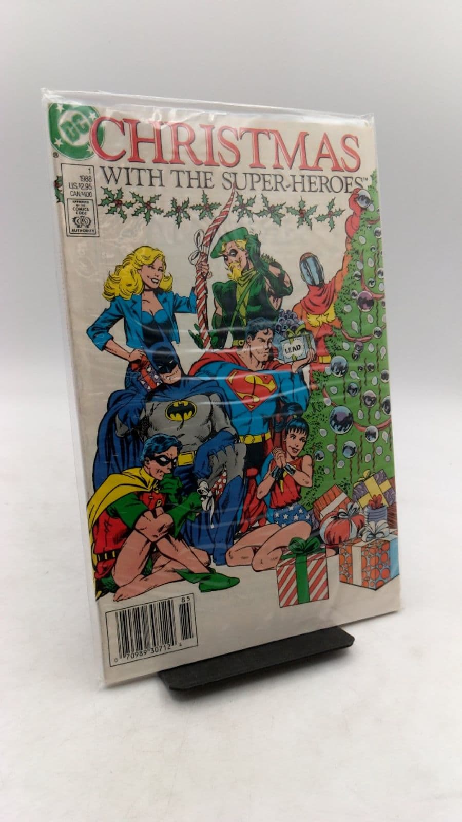 Christmas with the Super-Heroes #1 by Adams, Anderson, Bridwell, Cardy, Dillin, Friedrich, Garcia-Lopez, Giordano, Haney, Levitz, Miller, Mitchell, O'Neil, Swan, and Wein - front cover