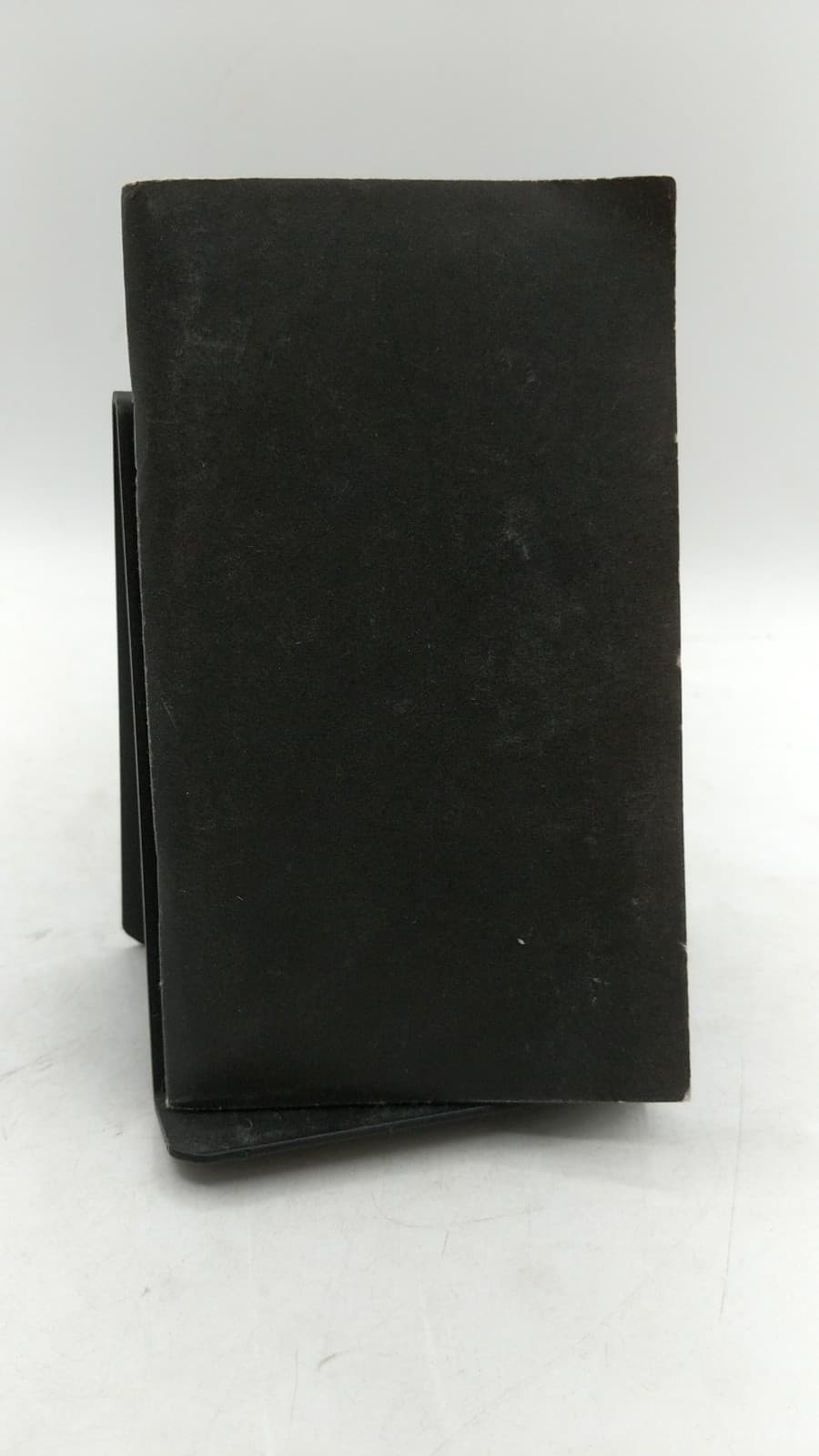 The Little Black Book: Six-minute meditations on the Passion according to Luke by Ken Untener - front cover