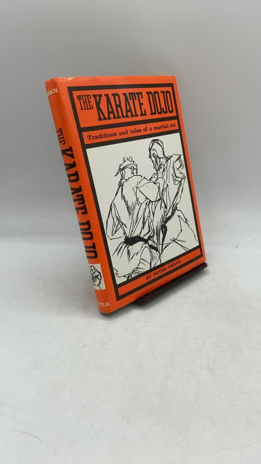 The Karate Dojo: Traditions and tales of a martial art by Peter Urban - front cover