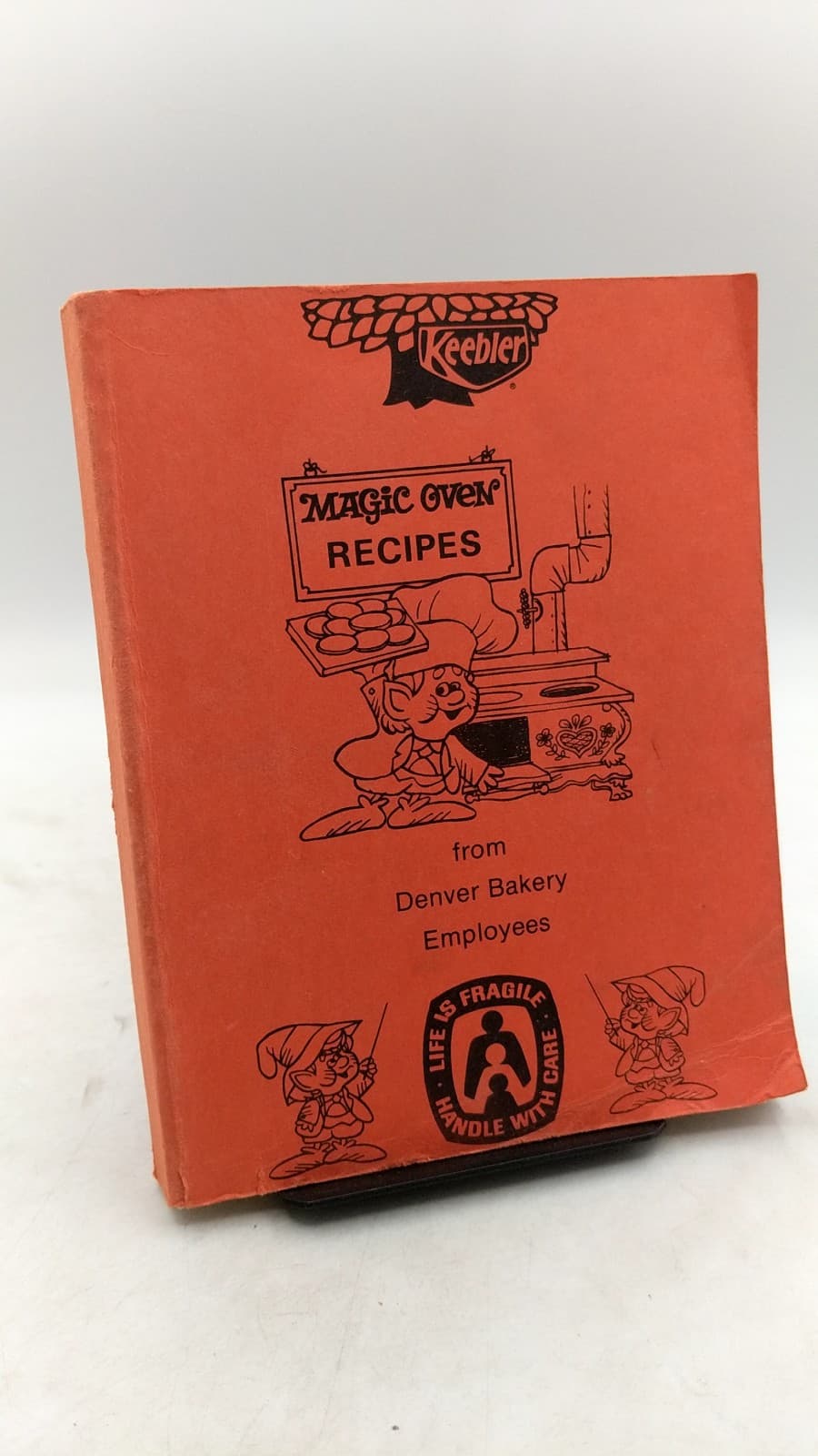 Magic Oven Recipes from Denver Bakery Employees by Edna Kruger (Project Lead) - front cover
