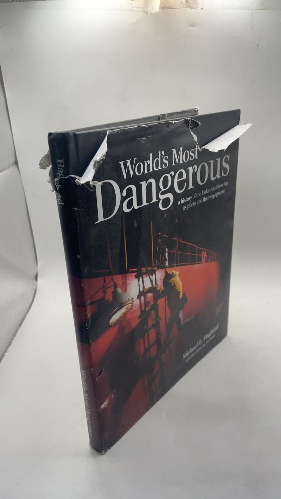 Signed World's Most Dangerous: a history of the Columbia River Bar, its pilots and their equipment by Michael E. Haglund - front cover