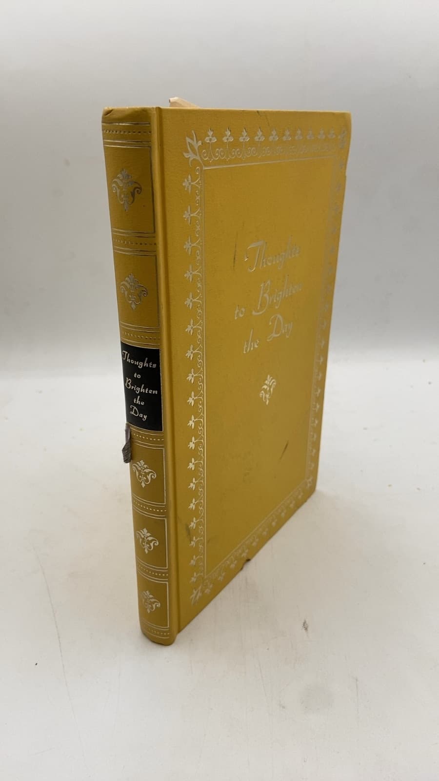 Thoughts to Brighten the Day by Thomas C. Jones - front cover