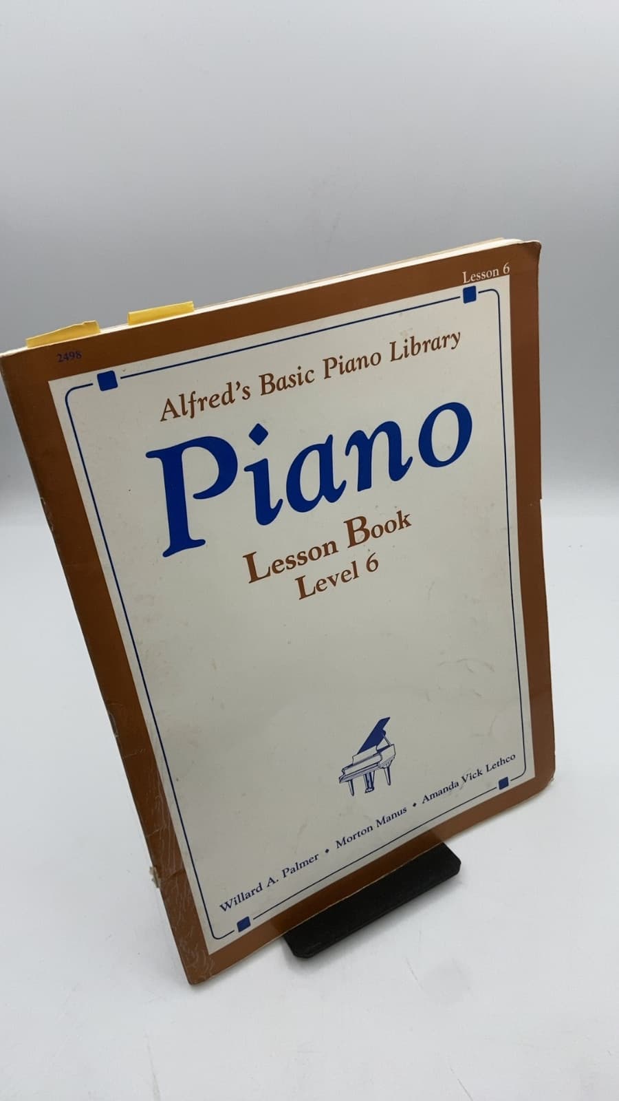 Alfred's Basic Piano Library Piano Lesson Book Level 6 by Willard A. Palmer, Morton Manus, Amanda Vick Lethco - front cover