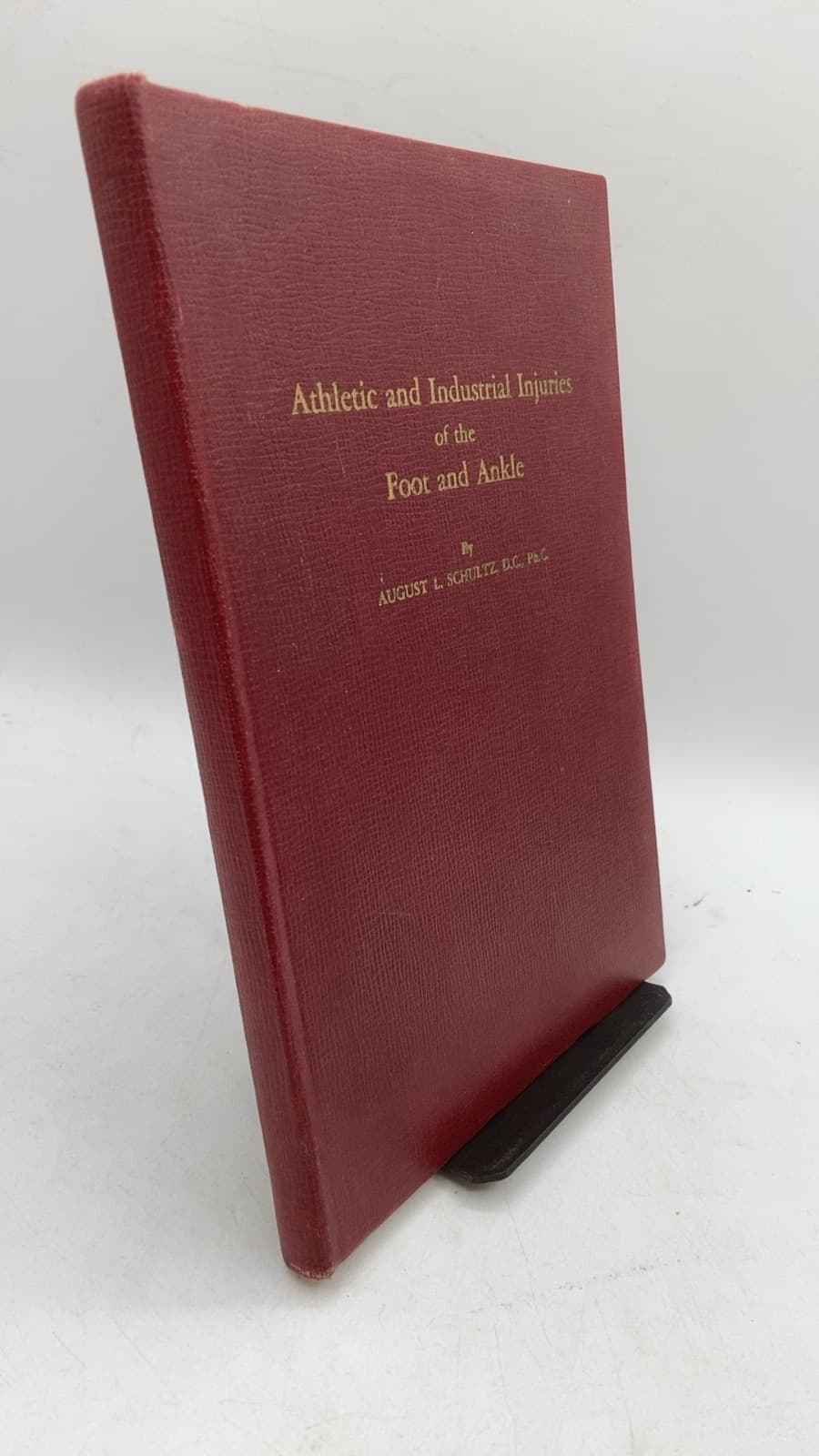 Athletic and Industrial Injuries of the Foot and Ankle by August L. Schultz, D.C., Ph.C. - front cover