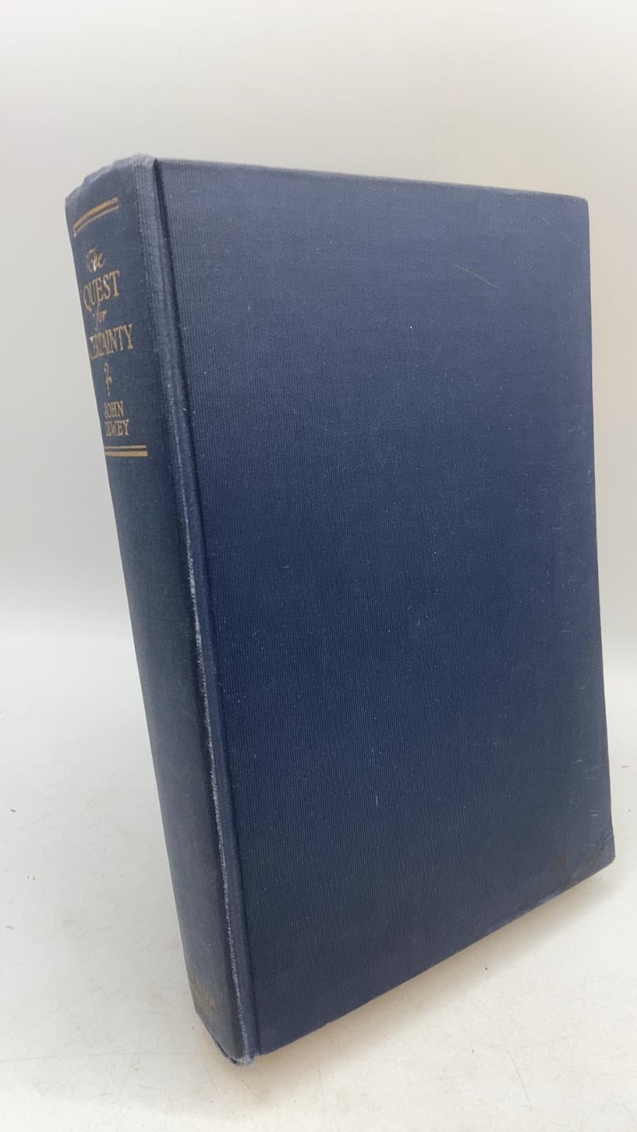 The Quest for Certainty: A Study of the Relation of Knowledge and Action by John Dewey - front cover