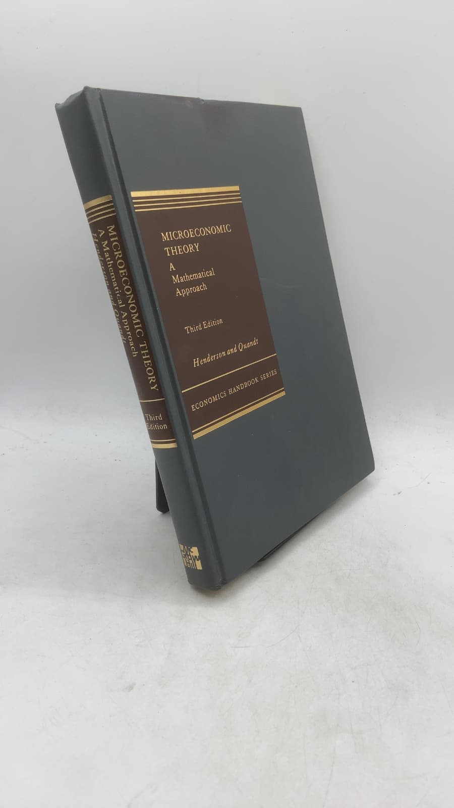 Microeconomic Theory: A Mathematical Approach by James M. Henderson and Richard E. Quandt - front cover