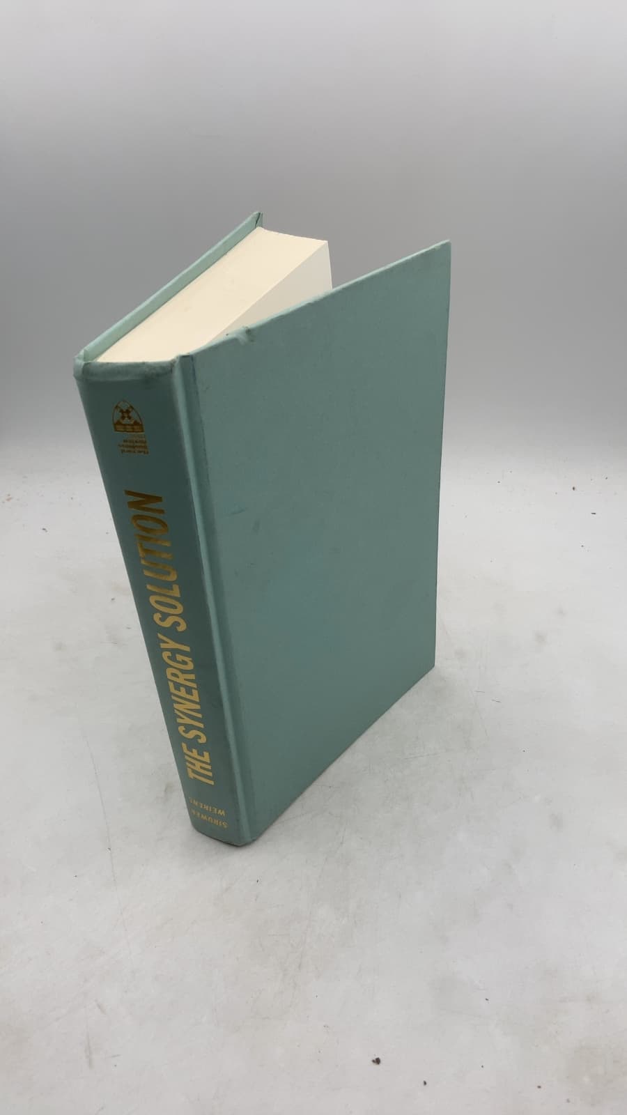 The Synergy Solution: How Companies Win the Mergers and Acquisitions Game by Mark L. Sirower, Jeffery M. Weirens - front cover